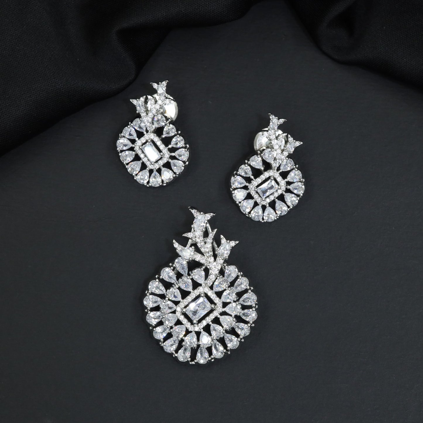 Circular Pendant Set with Floral Arrangement Detailing