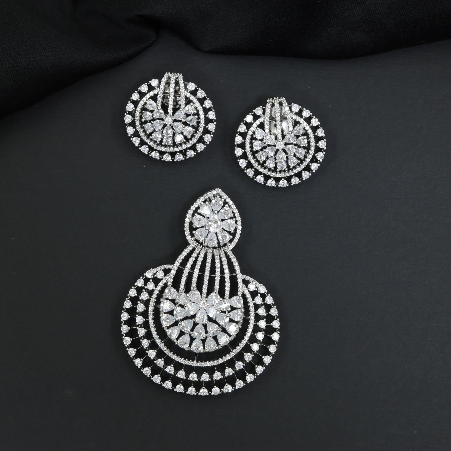 Elegant Pendant Set with Floral Centre and Halo Border