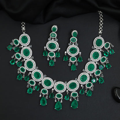 Imperial graduating layout rhodium necklace with a hanging central teardrop cluster