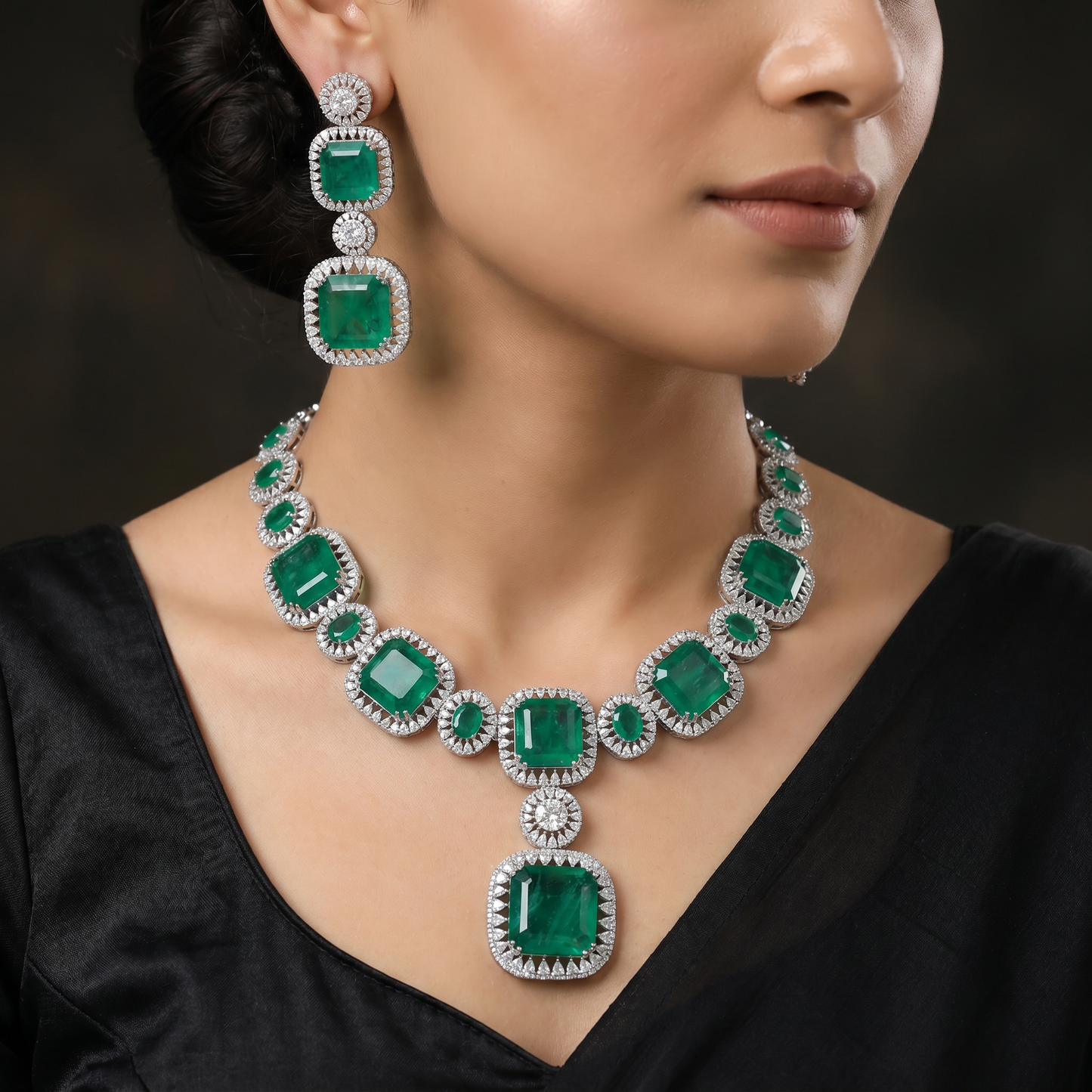 Traditional cushion plaque rhodium necklace set with a suspended square pendant