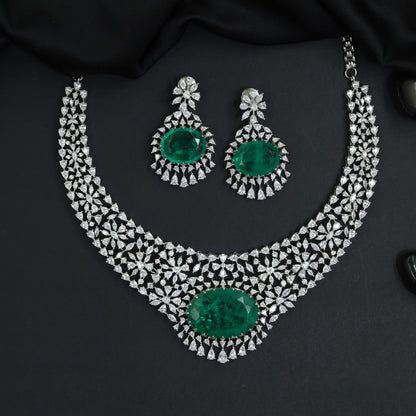 Traditional floral cluster mesh rhodium necklace set with a large oval centerpiece
