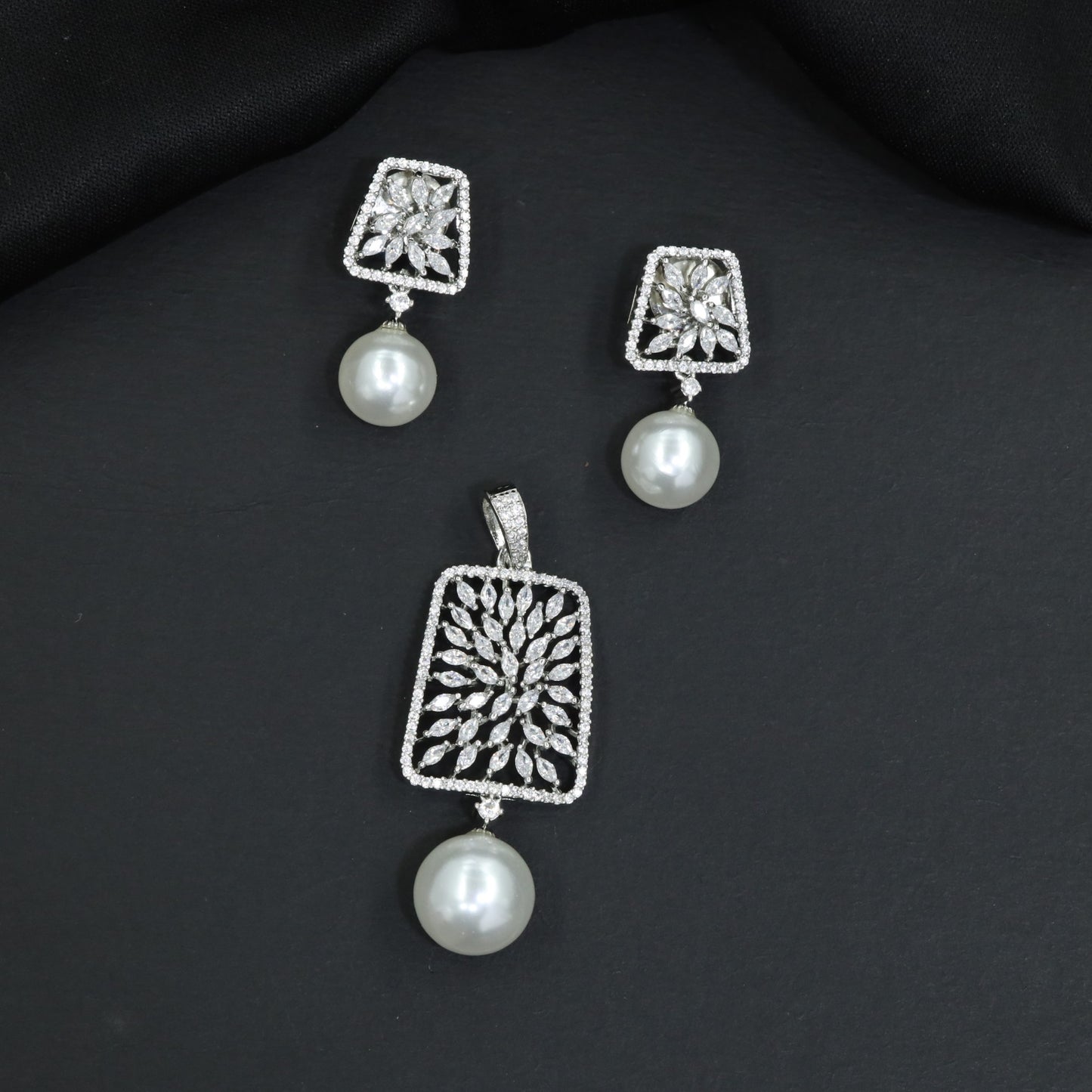 Designer Pendant Set with Openwork Craftsmanship and Matching Earrings