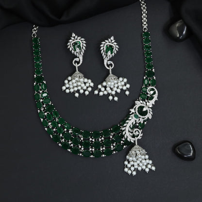 Traditional multi-row oval plaque rhodium necklace set with a hanging jhumka tassel