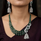 Traditional multi-row oval plaque rhodium necklace set with a hanging jhumka tassel