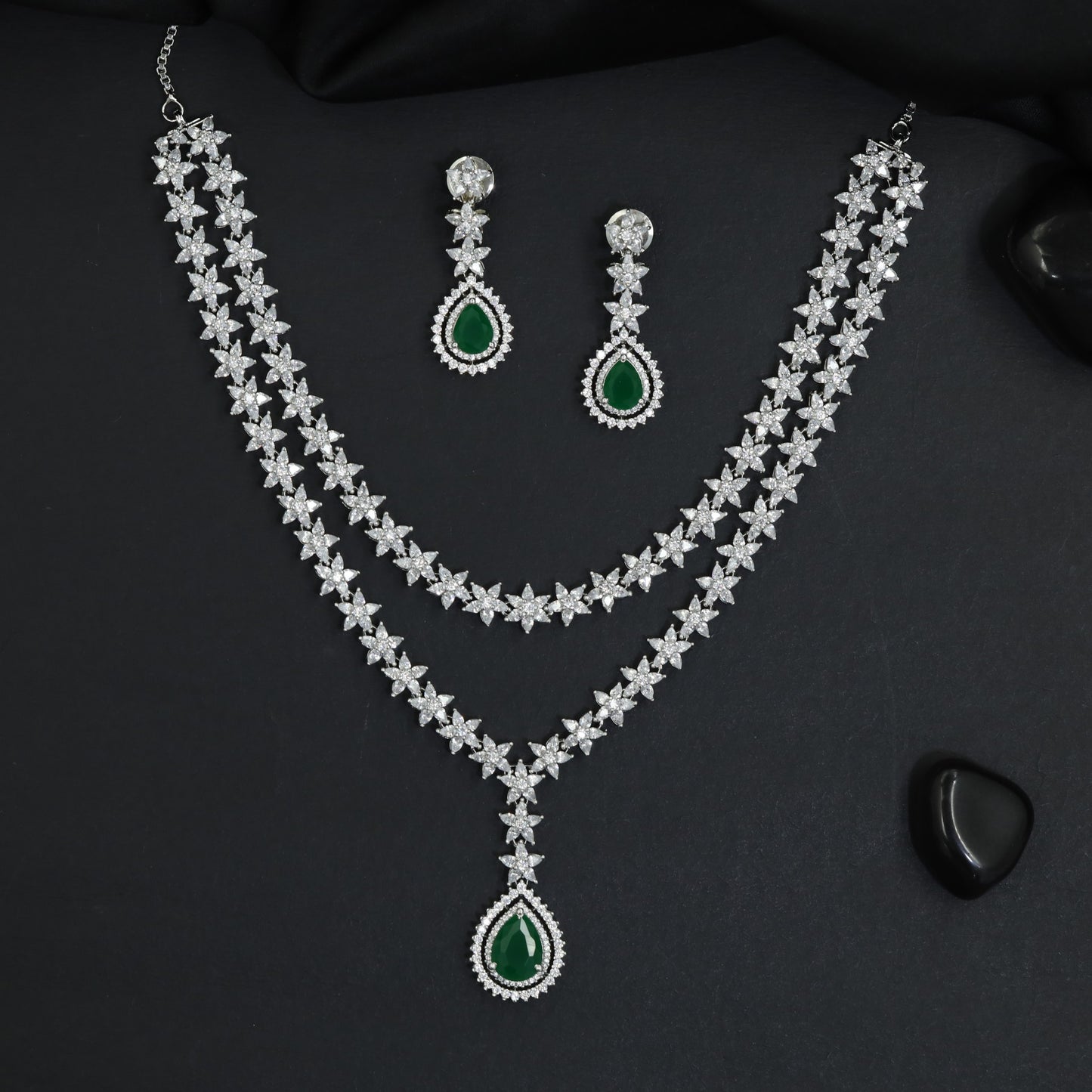 Traditional double layer rosette star strand rhodium necklace with teardrop pendant
