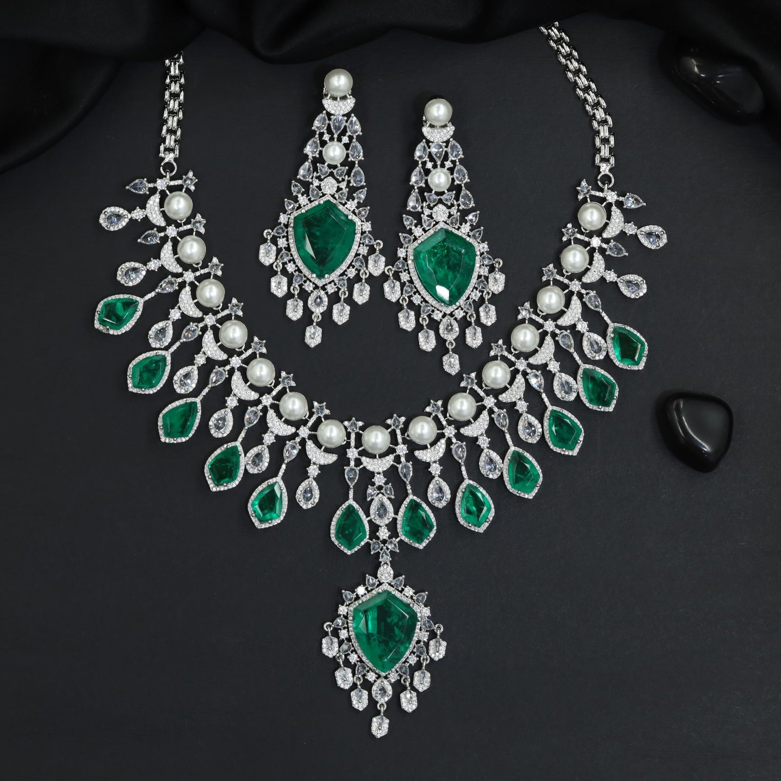 Radiant textured cluster rhodium necklace with dramatic tiered statement studs