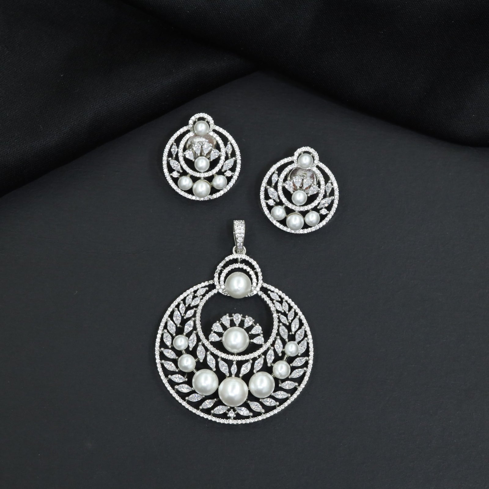 Festive Pendant Set with Openwork Design and Matching Earrings