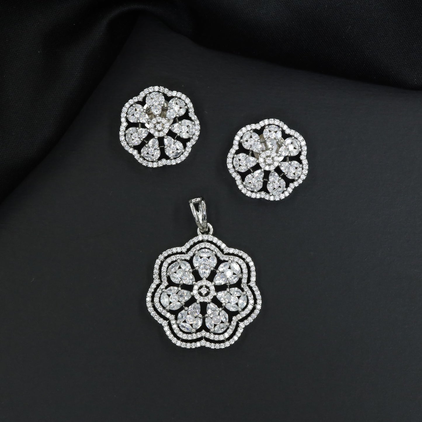 Contemporary Pendant Set with Blossom Design and Matching Earrings