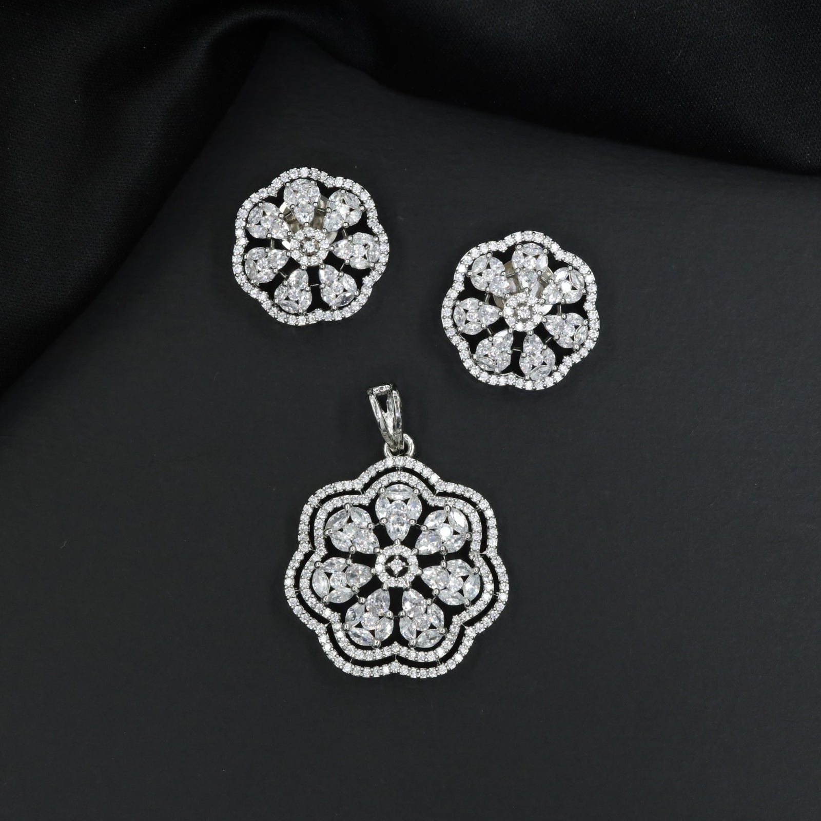 Contemporary Pendant Set with Blossom Design and Matching Earrings