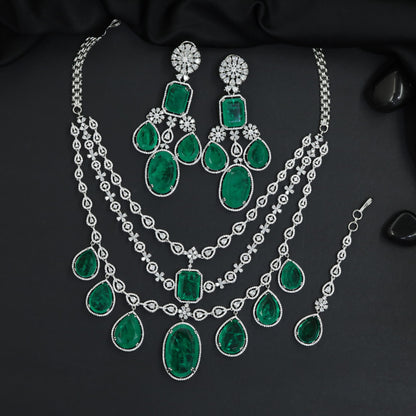 Shimmering clustered tiered statement rhodium necklace set