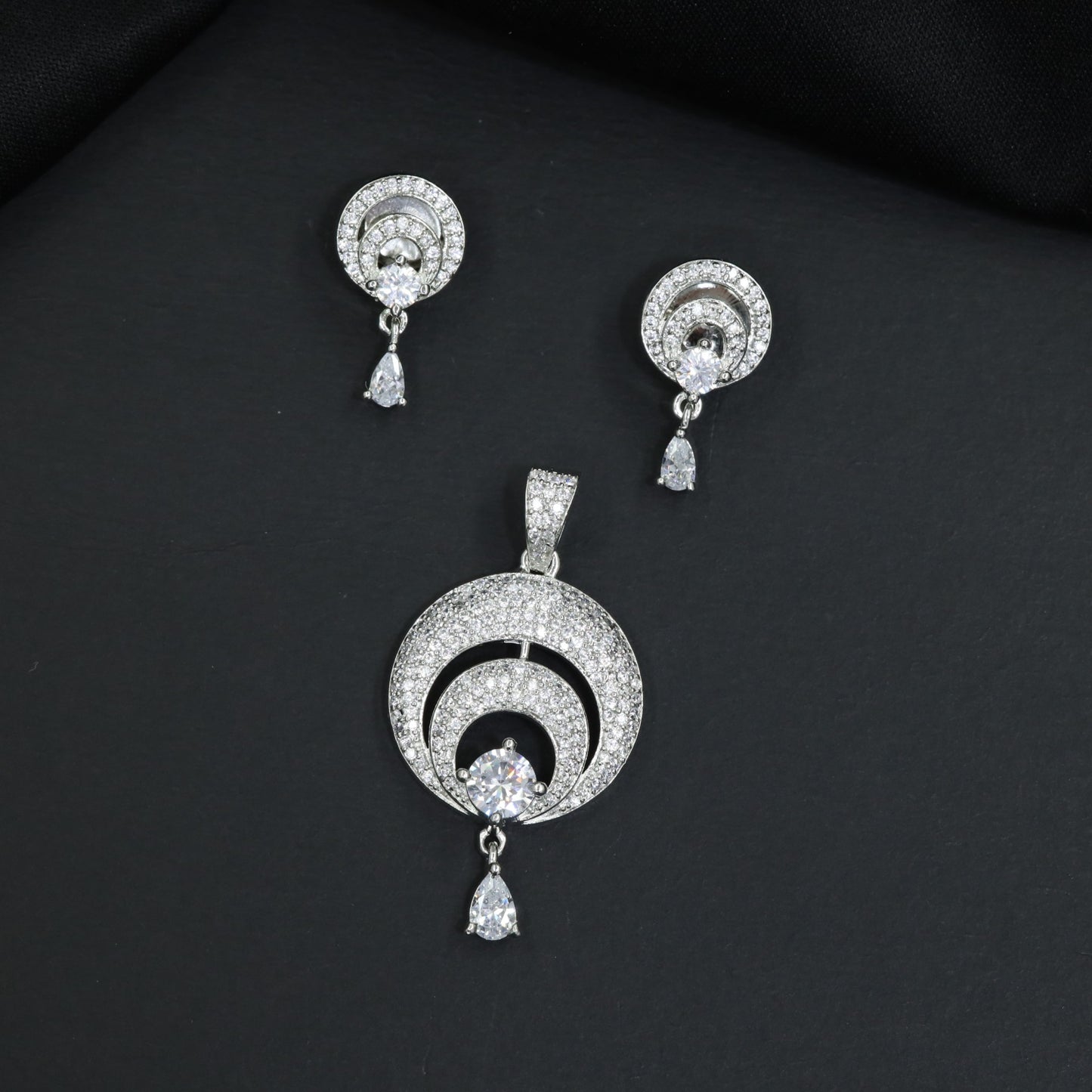 Elegant Pendant Set with Circular Frame and Matching Drop Earrings