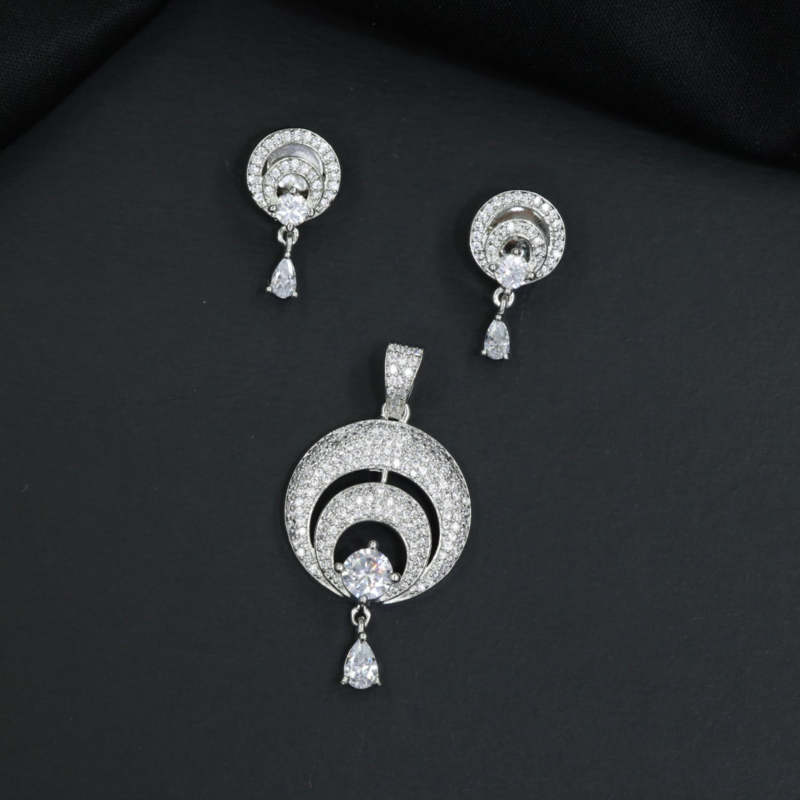 Elegant Pendant Set with Circular Frame and Matching Drop Earrings