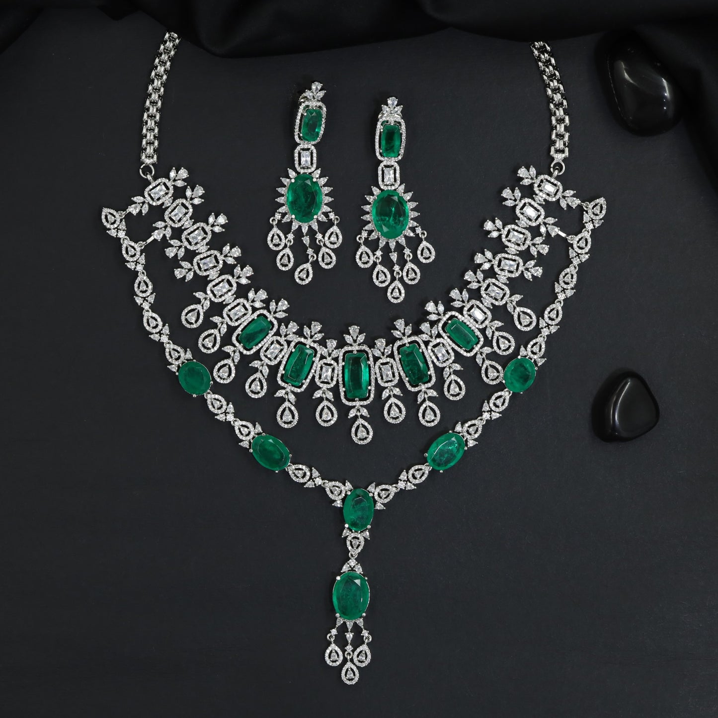 Elegant rhodium necklace featuring cascading stone accents