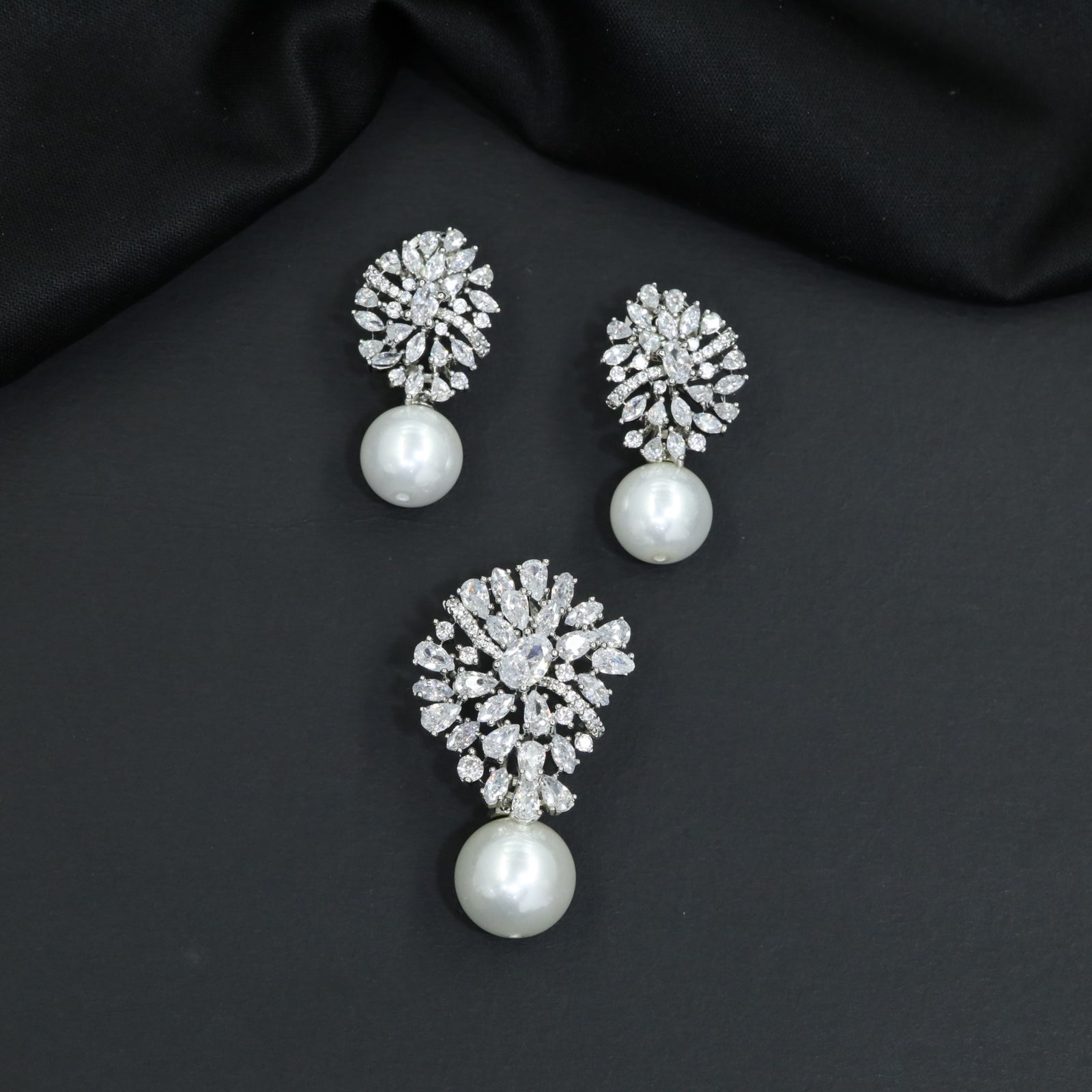 Modern Pendant Set with Floral Silhouette and Pearl Drop Styling