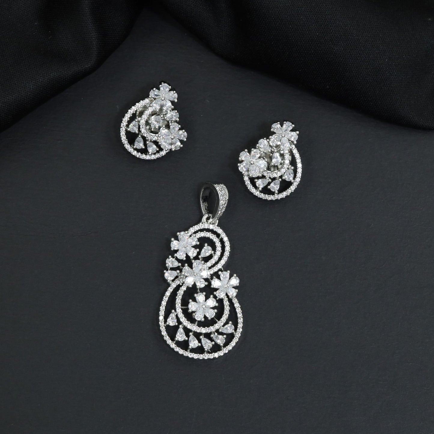 Decorative Pendant Set with Scroll Pattern and Floral Detailing