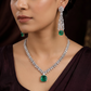Couture rhodium necklace showcasing structured pendant framework