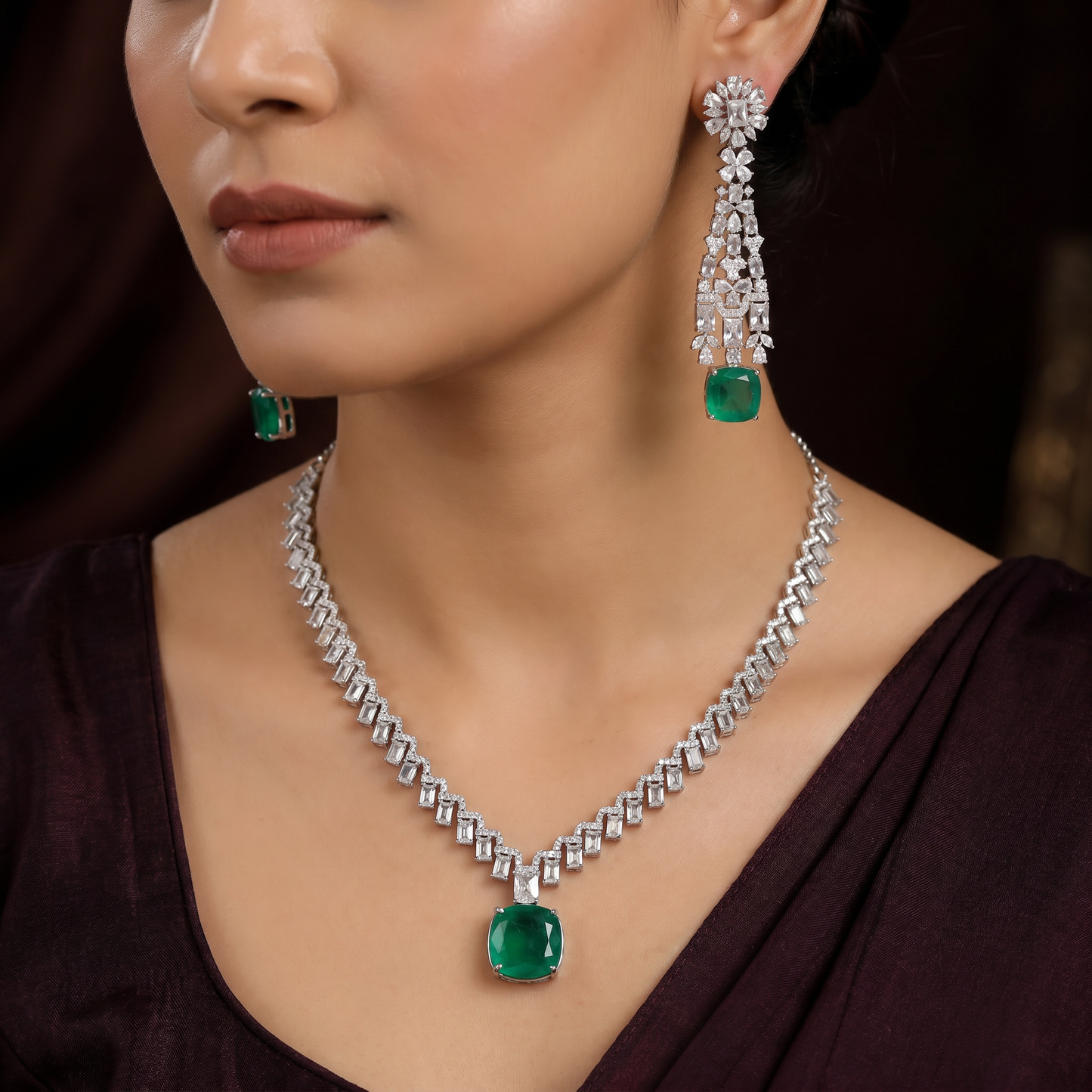 Couture rhodium necklace showcasing structured pendant framework