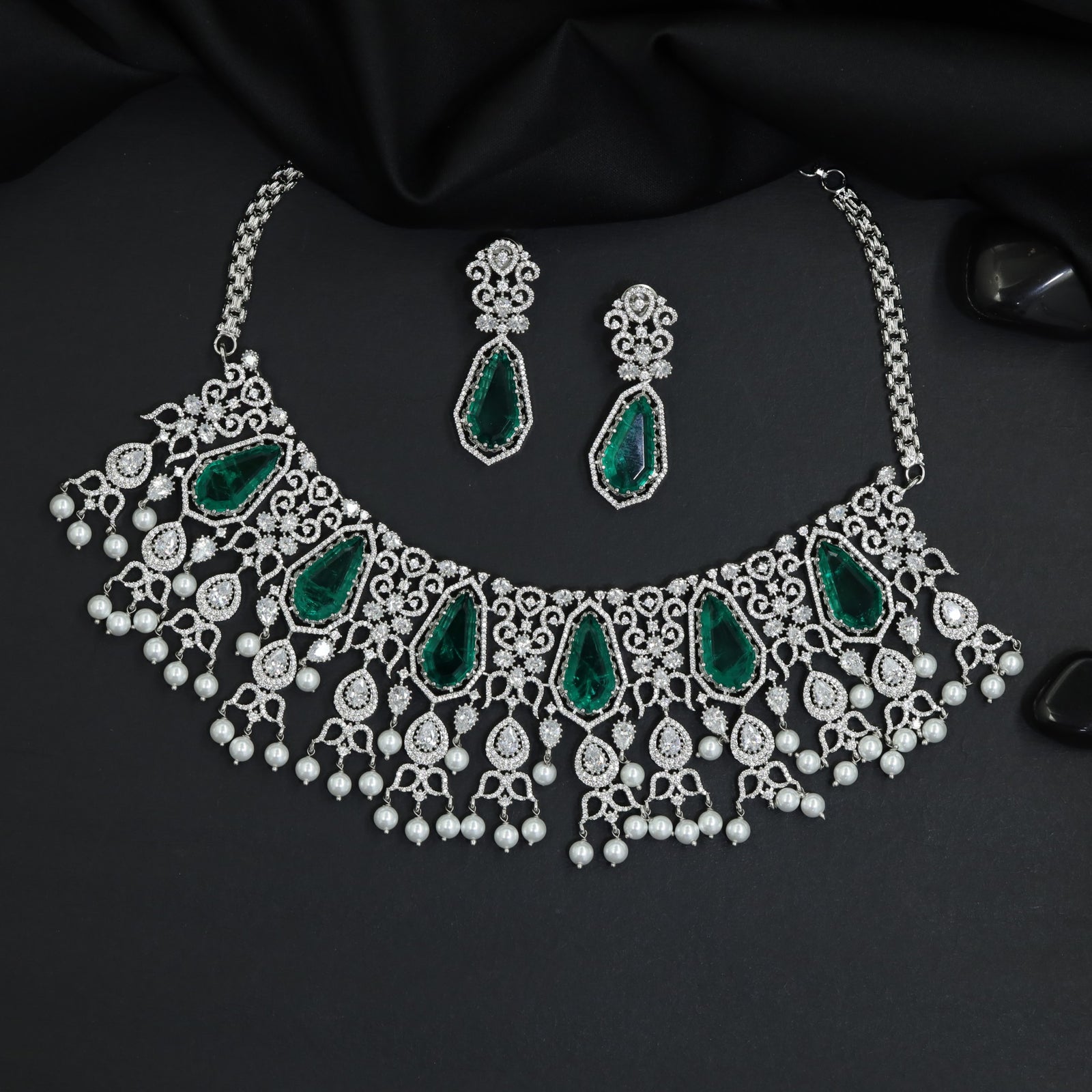 Signature rhodium choker featuring couture symmetrical artistry