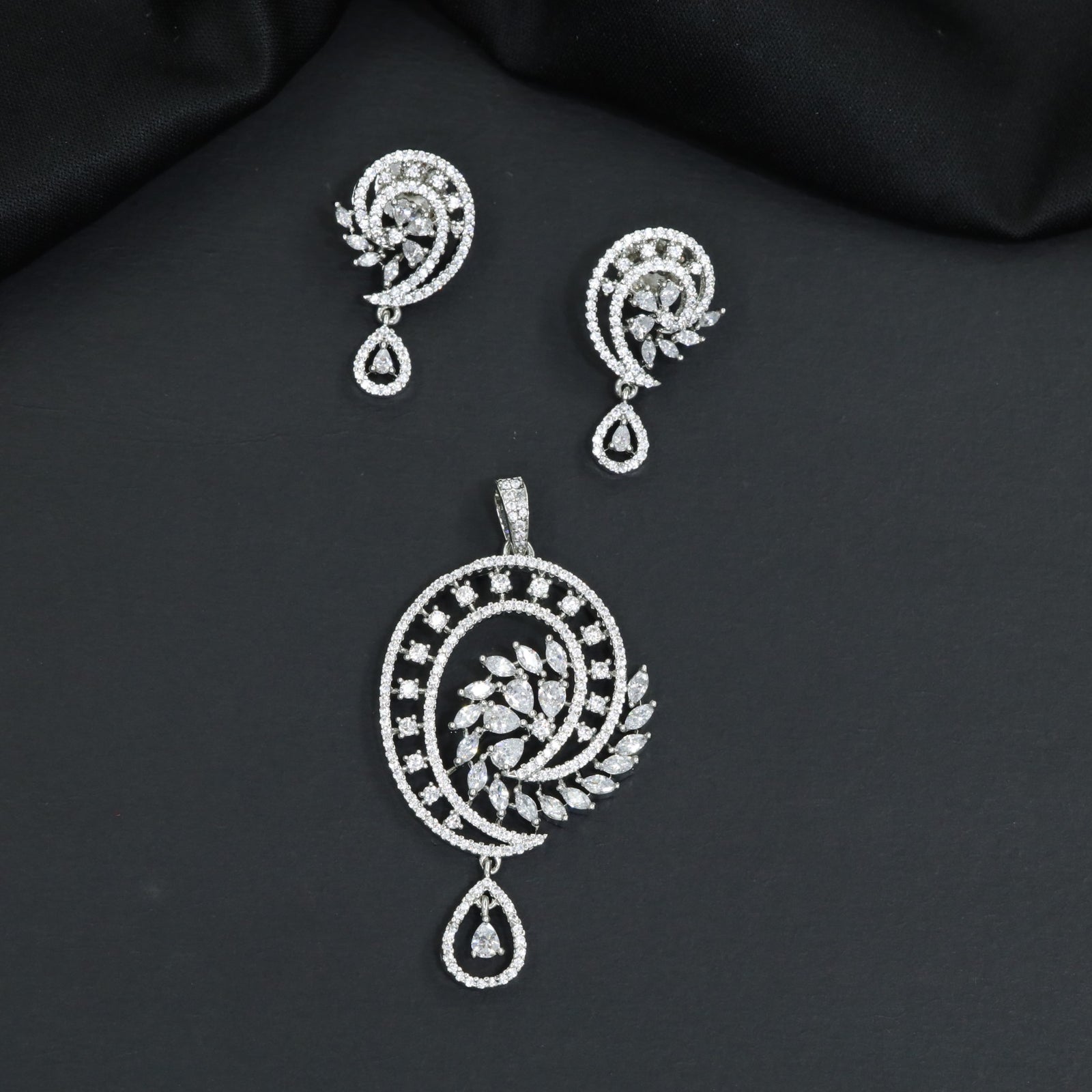 Contemporary Pendant Set with Open Spiral Design and Matching Earrings