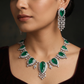 Bold rhodium necklace featuring statement gemstone silhouette