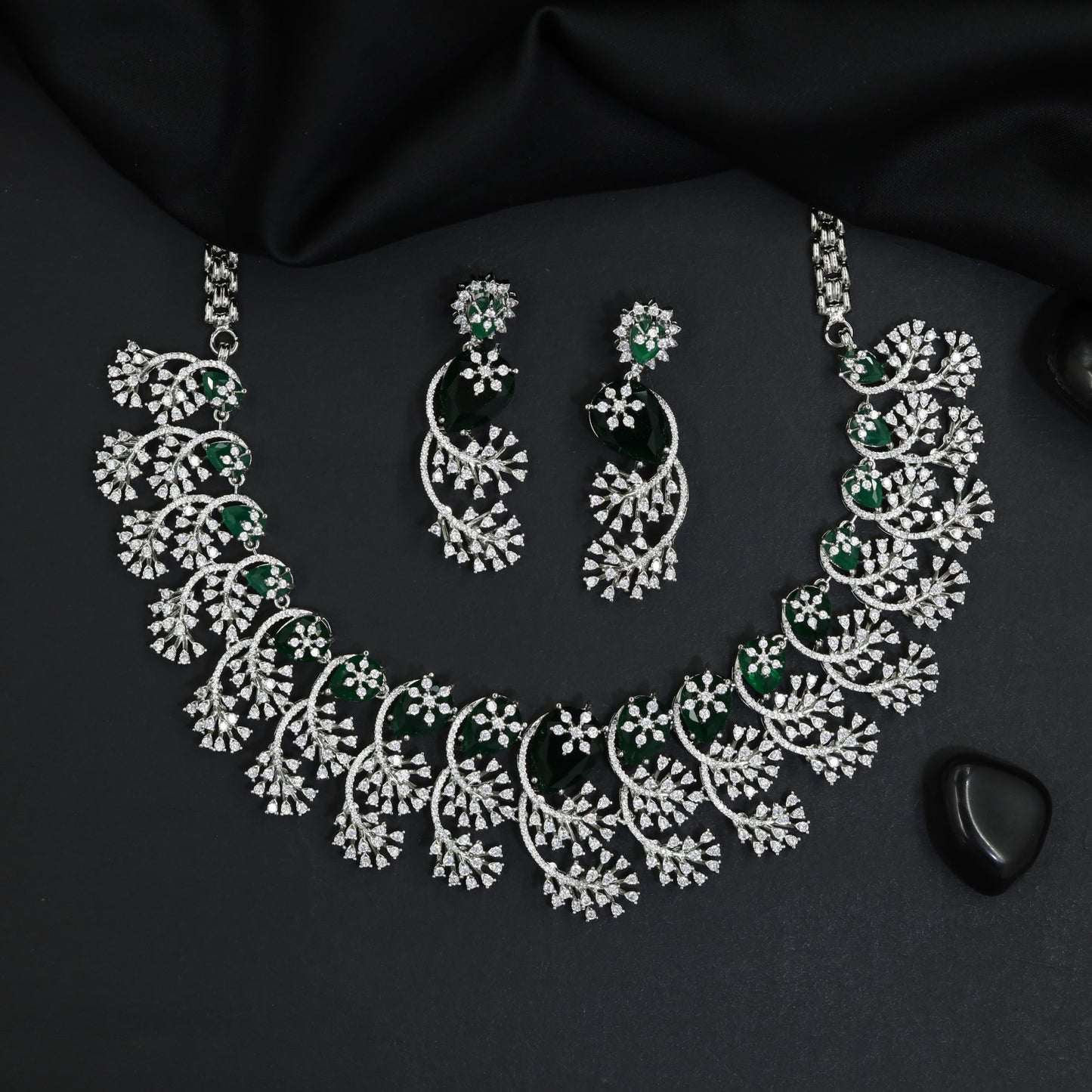 Sleek rhodium necklace showcasing structured fan framework