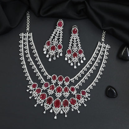 Festive Triple Strand Rhodium Necklace Set with Scalloped Drop Accents