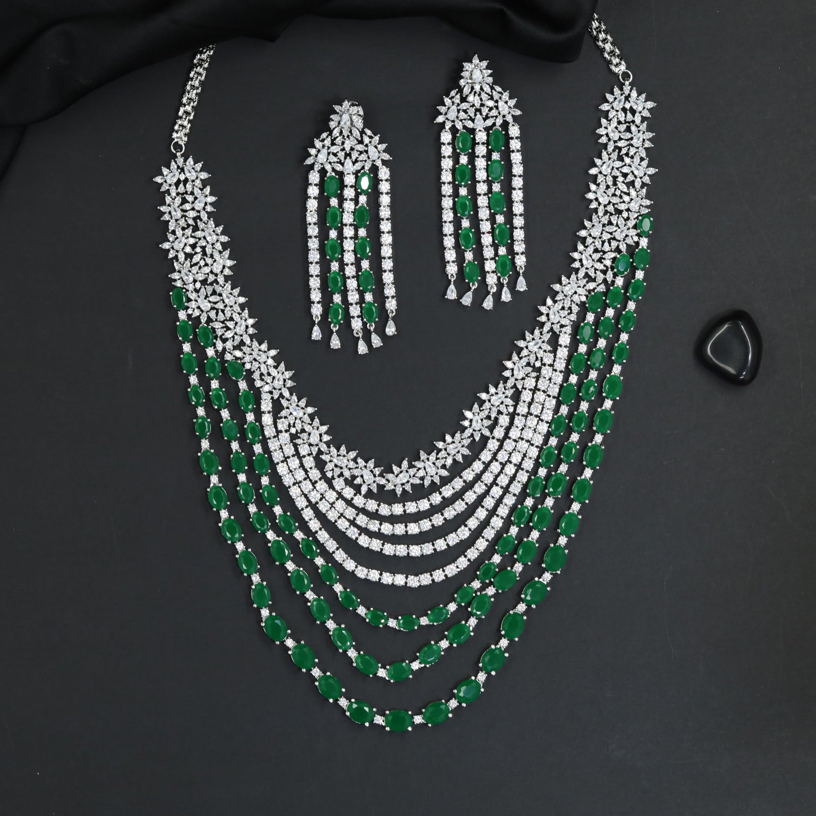 Sleek rhodium necklace showcasing structured cascade framework