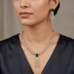 Elevated Gj necklace featuring ornamental gemstone artistry