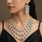 Gj necklace with ornate circular detailing