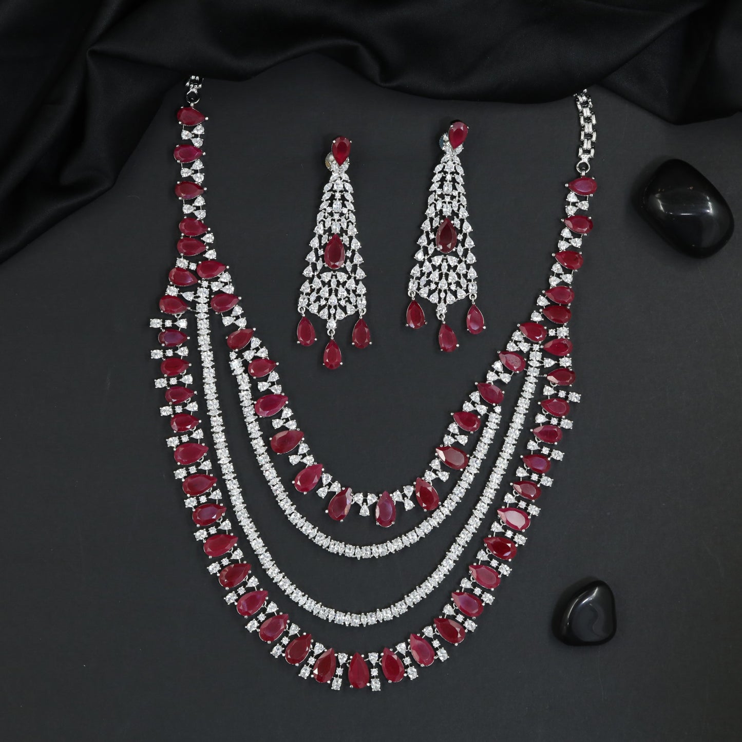 Multi Strand Rhodium Long Haara with Scalloped Drop Border