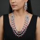 Triple Strand Rhodium Long Haara with Geometric Medallion Accents