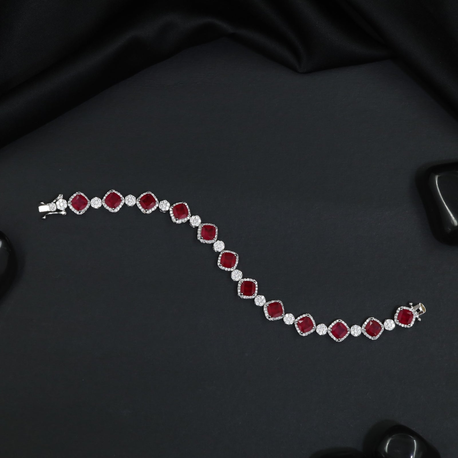 Rhodium Bracelet with Repeating Cushion Elements and Floral Clusters