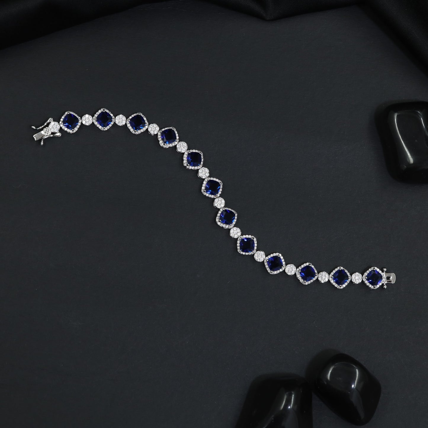 Rhodium Bracelet with Repeating Cushion Elements and Floral Clusters