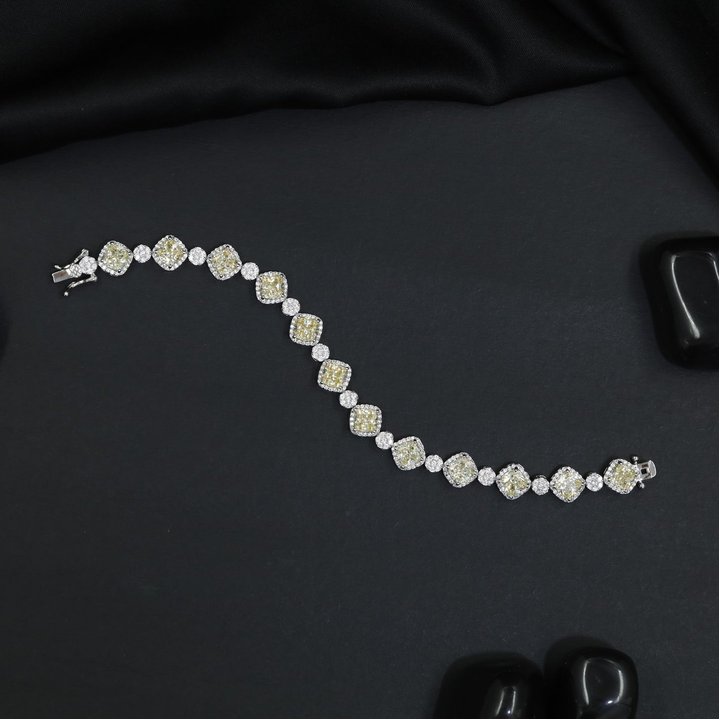 Rhodium Bracelet with Repeating Cushion Elements and Floral Clusters