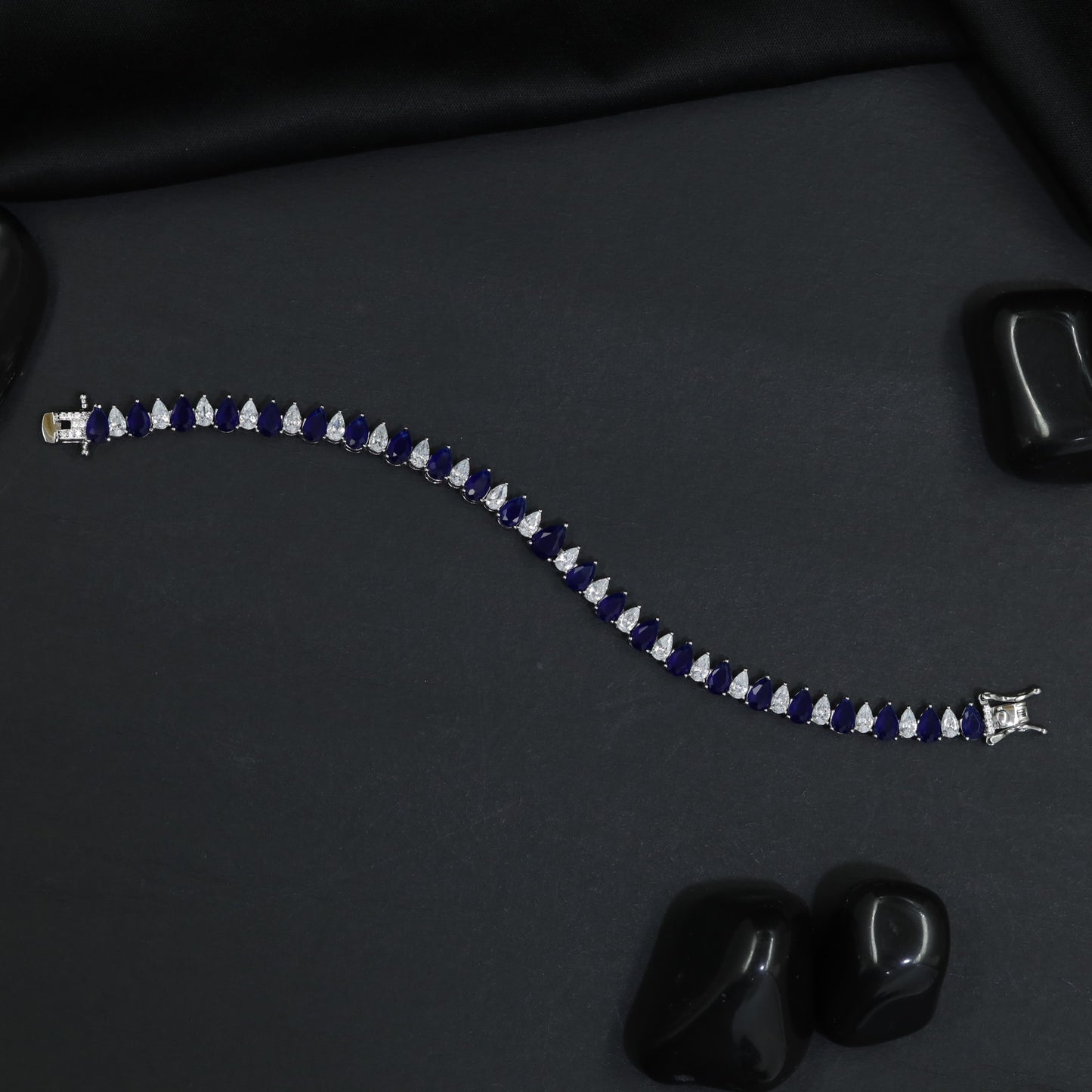 Rhodium Bracelet with Linked Leaf Elements and Graceful Silhouette