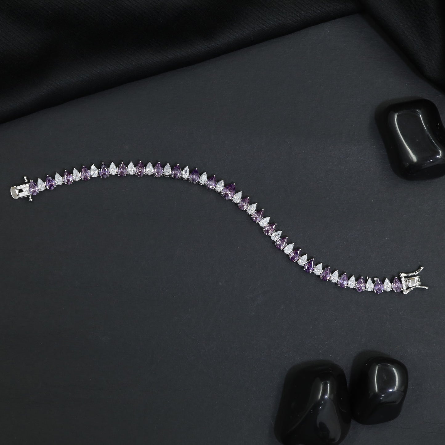 Rhodium Bracelet with Linked Leaf Elements and Graceful Silhouette