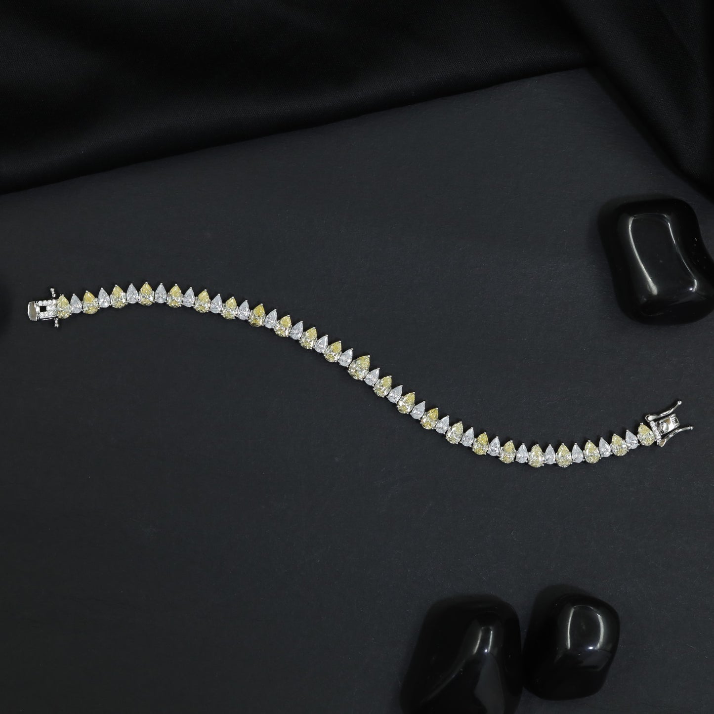 Rhodium Bracelet with Linked Leaf Elements and Graceful Silhouette