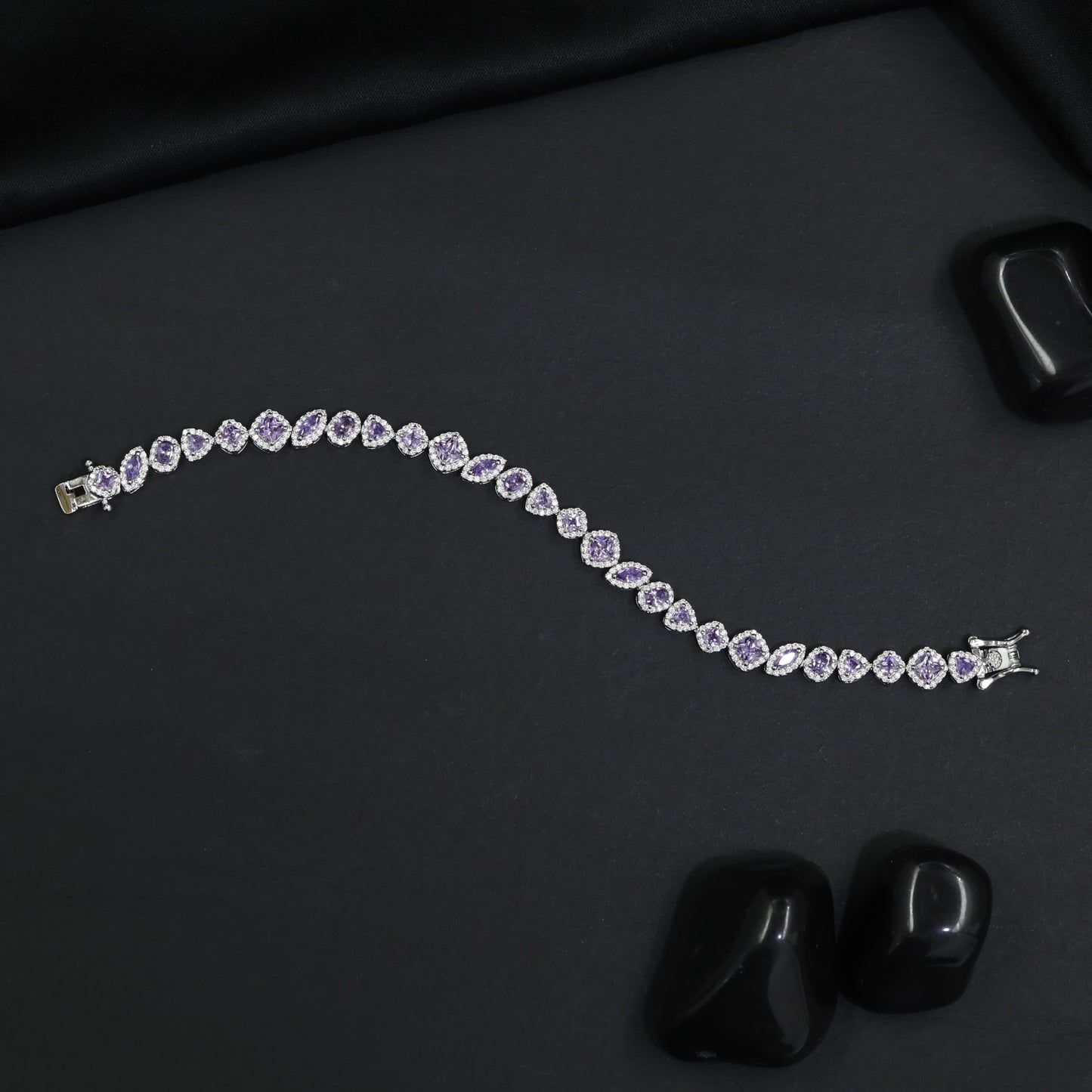 Contemporary Rhodium Bracelet with Alternating Floral and Leaf Design