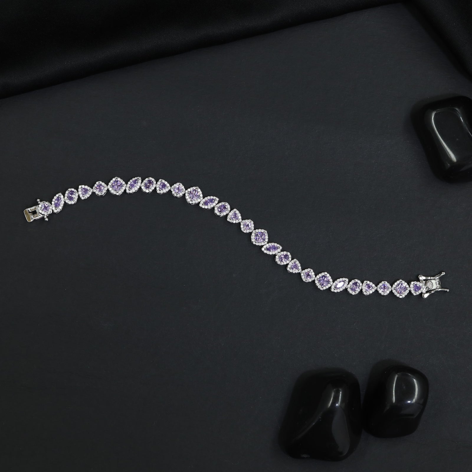 Contemporary Rhodium Bracelet with Alternating Floral and Leaf Design