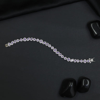 Contemporary Rhodium Bracelet with Alternating Floral and Leaf Design