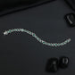 Contemporary Rhodium Bracelet with Alternating Floral and Leaf Design