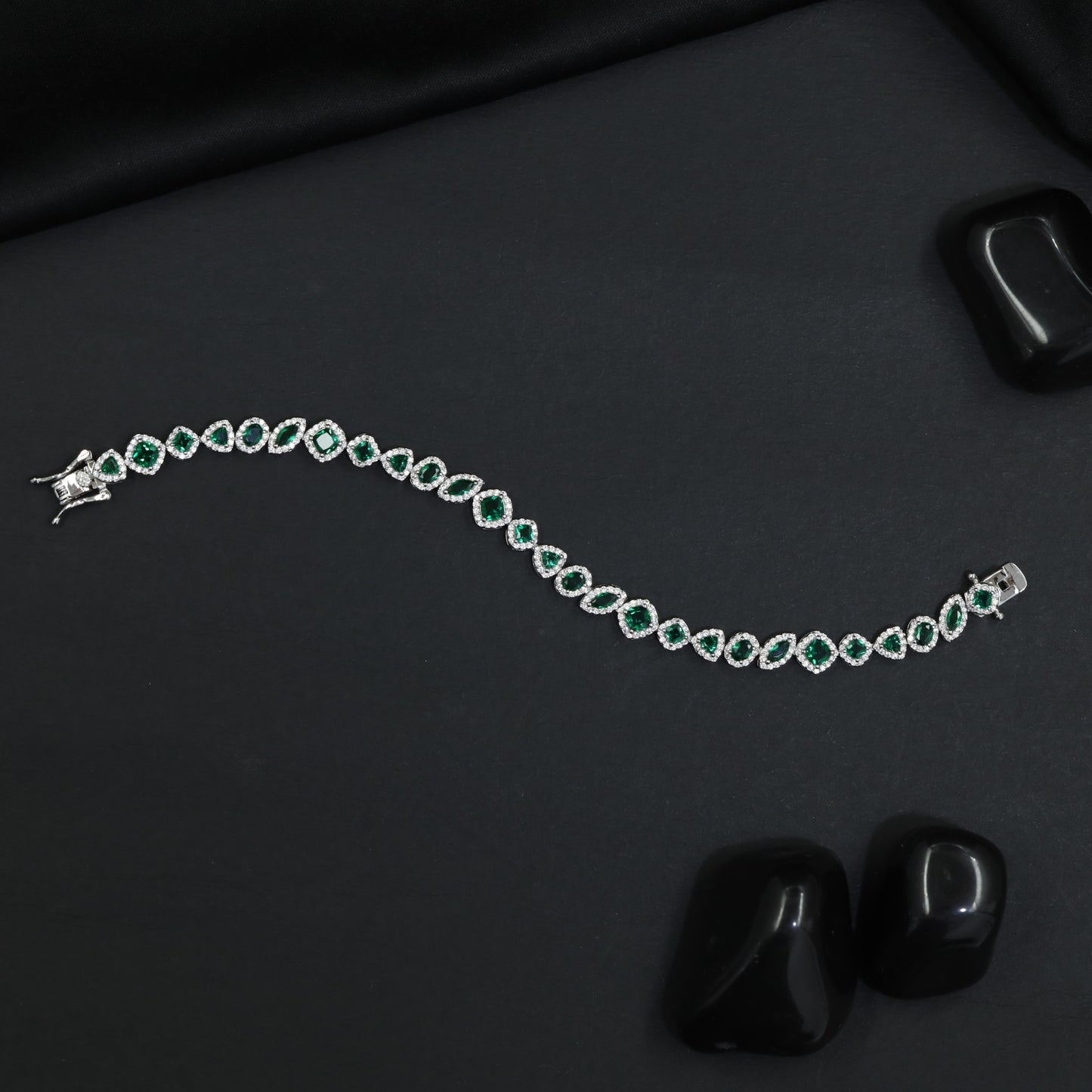 Contemporary Rhodium Bracelet with Alternating Floral and Leaf Design