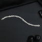 Contemporary Rhodium Bracelet with Alternating Floral and Leaf Design
