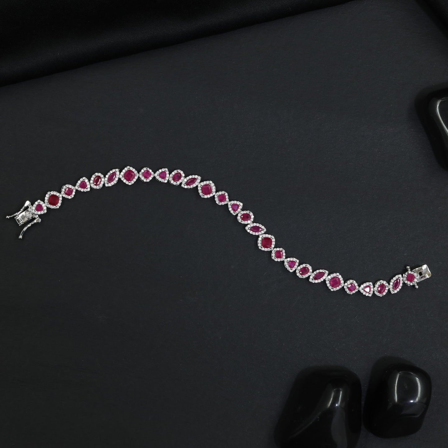 Contemporary Rhodium Bracelet with Alternating Floral and Leaf Design