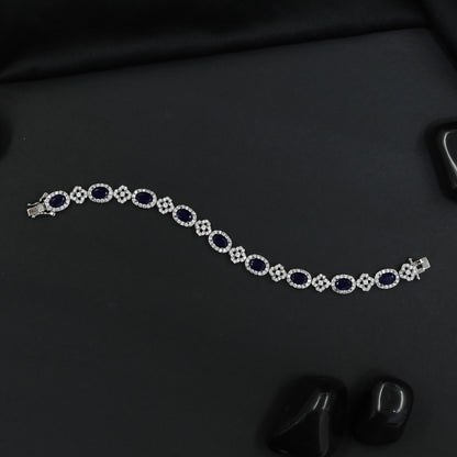 Rhodium Bracelet with Repeating Rosette Elements and Circular Links