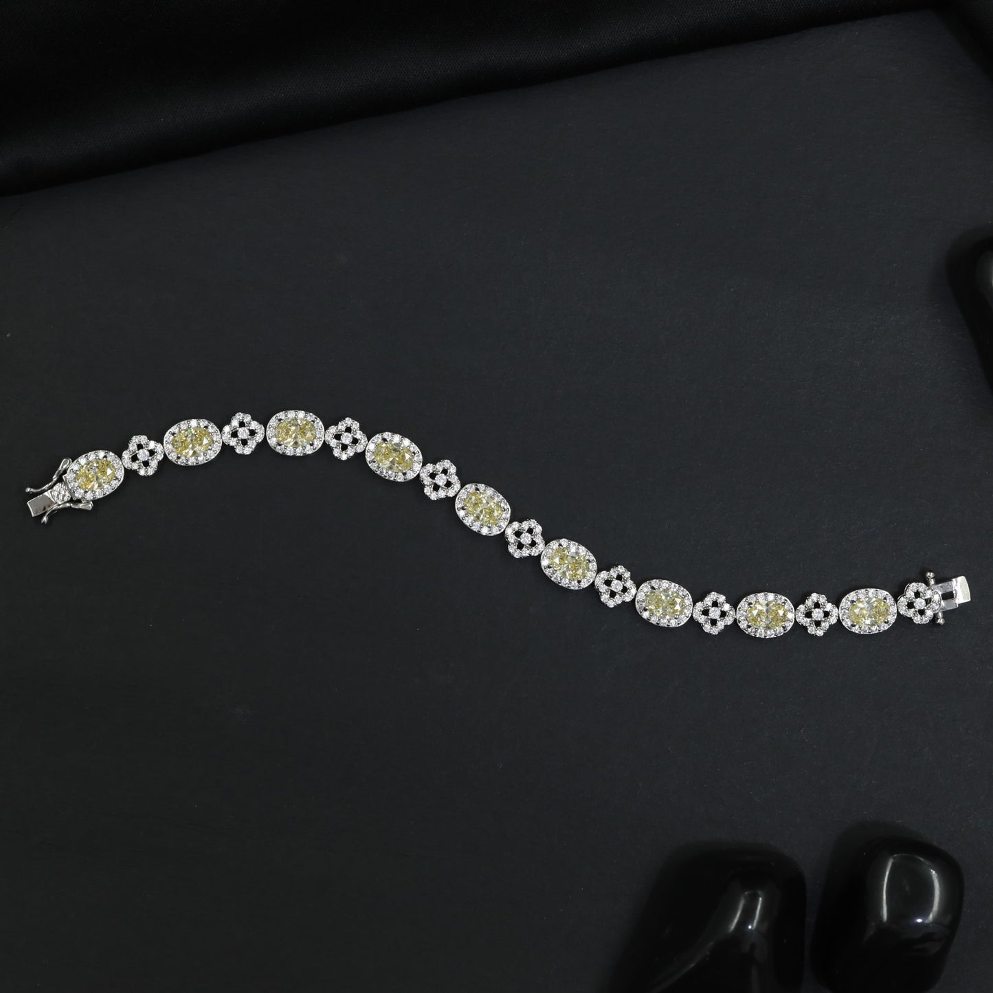 Rhodium Bracelet with Repeating Rosette Elements and Circular Links