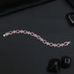 Rhodium Bracelet with Repeating Rosette Elements and Circular Links