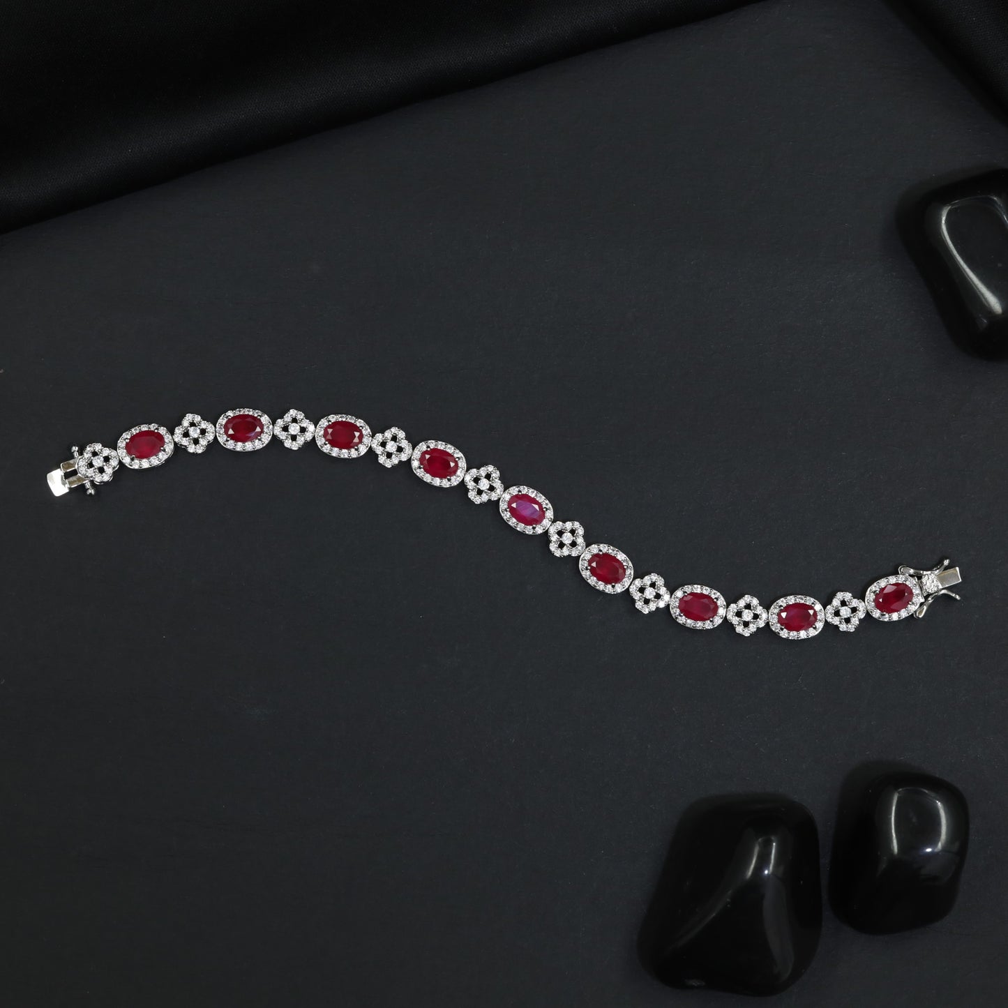 Rhodium Bracelet with Repeating Rosette Elements and Circular Links