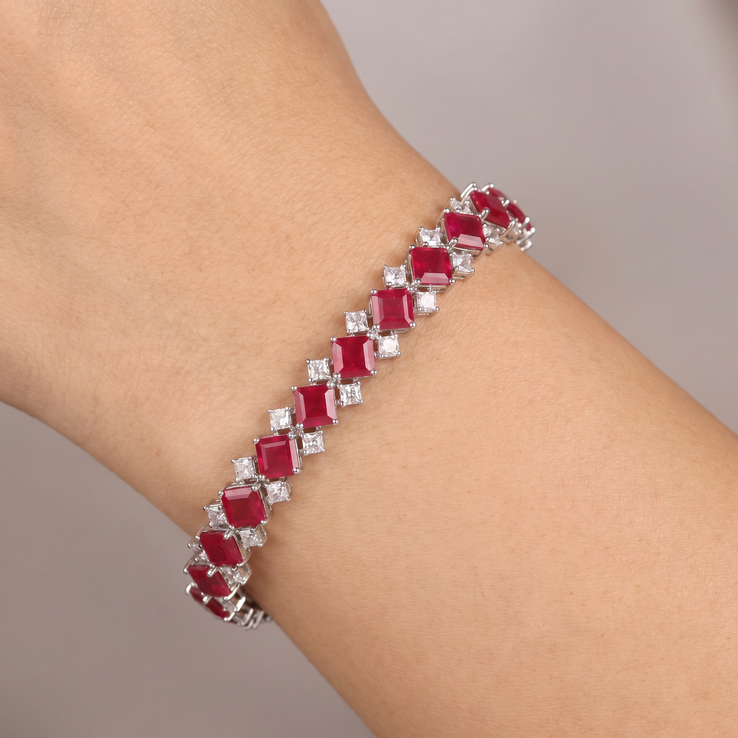 Rhodium Bracelet with Repeating Cushion Elements and Angular Accents