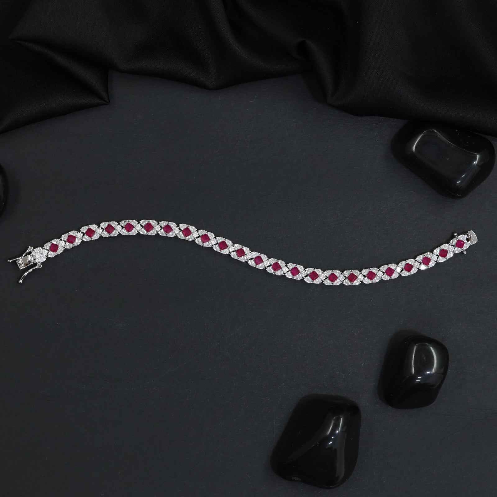 Rhodium Bracelet with Balanced Chevron Arrangement and Floral Details